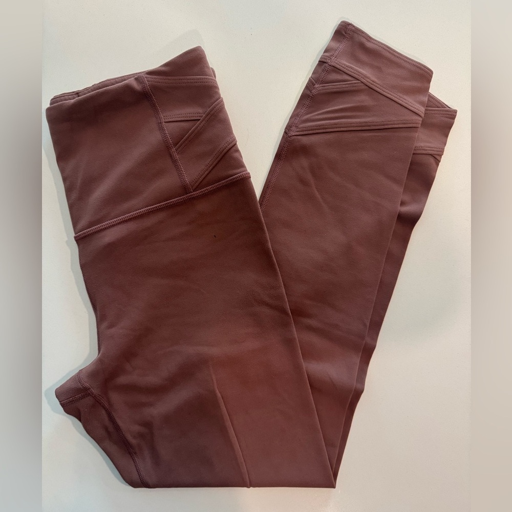 Athleta Elation Pirouette 7/8 tight in a Dusty Rose color, size small